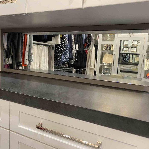 A mirror installed in wardrobe area