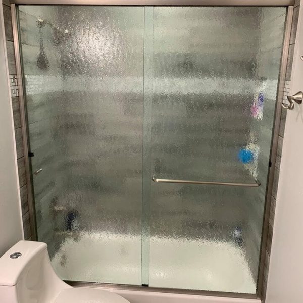 A decorative glass in shower area