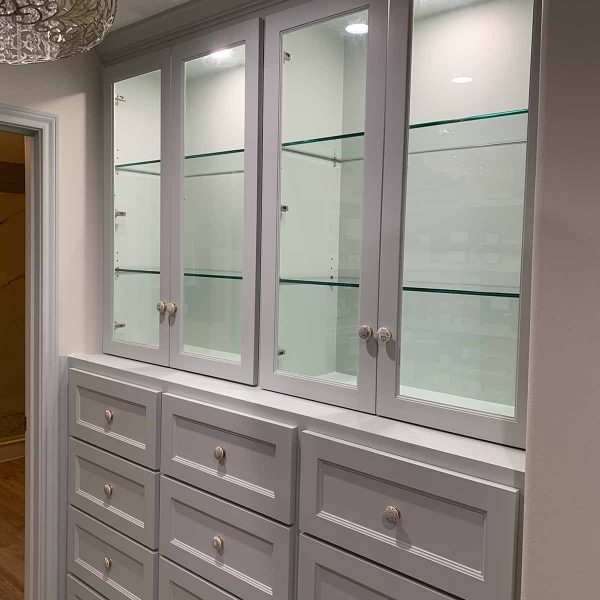 A glass shelves in wardrobe area