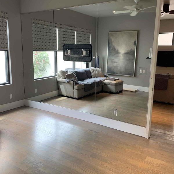 A huge mirror installed in living room