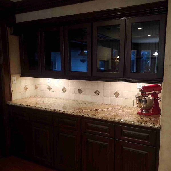 A beautiful kitchen with wooden cabinet