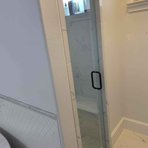 A glass door for bathroom area