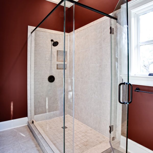 A beautiful glass shower door in shower area